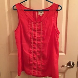 Sleeveless pink ruffle blouse with keyhole back